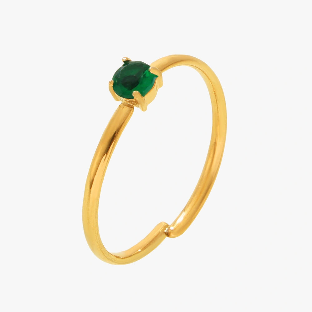 Gold minimalist adjustable ring with green zircon stone.