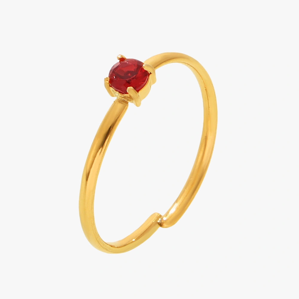 Gold minimalist adjustable ring with red zircon stone.
