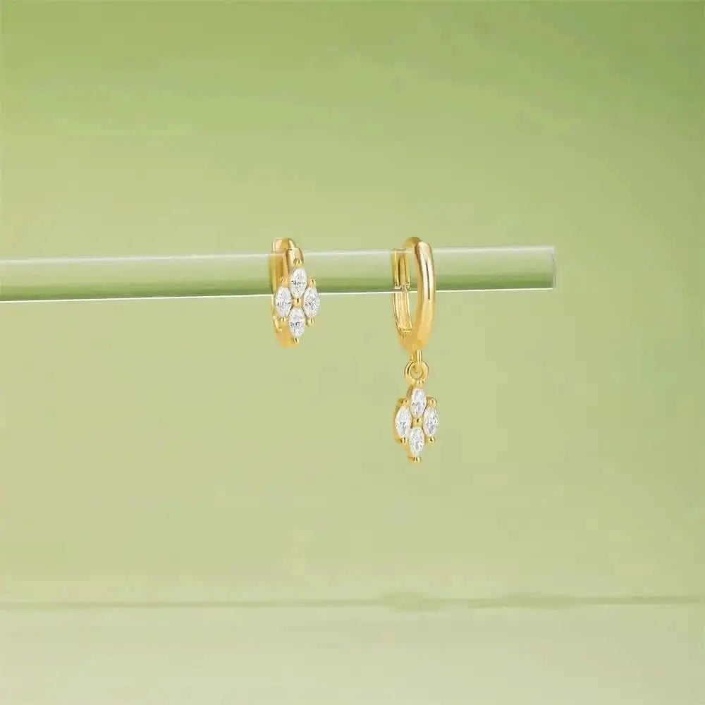 Minimalist Flower Dangle Earrings – Elevate your look with these simple yet sophisticated flower dangle earrings. Ideal for adding subtle sparkle to any outfit.