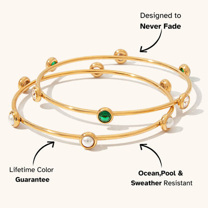 Stackable gold bangles with small pearl accents