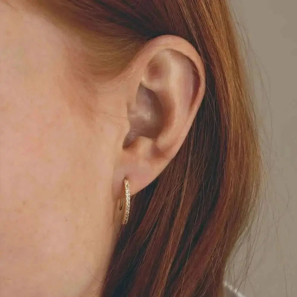 Minimalist Gold Ear Threaders – These delicate threader earrings create a modern, understated look with their lightweight gold design. Ideal for both casual and formal settings, these ea