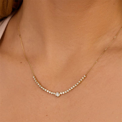 Minimalist cubic zirconia necklace in a delicate gold-plated chain, perfect for everyday elegance.