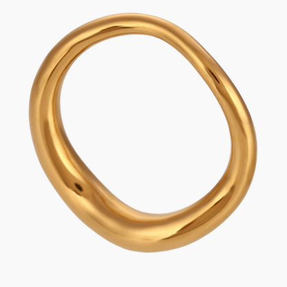 Flat-lay styling of wave ring surrounded by complementary rings