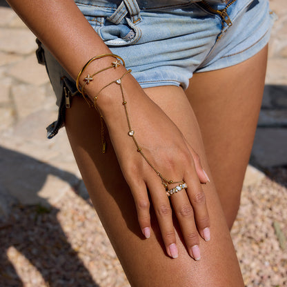 Model wearing Starlit Tide bracelet stacked with denim outfit.