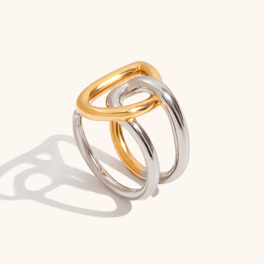 Minimalist two-tone open band ring in silver and gold with bold abstract design