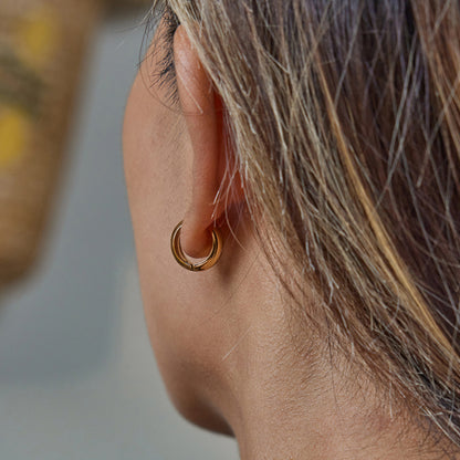 Classic gold hoops with lifetime color guarantee