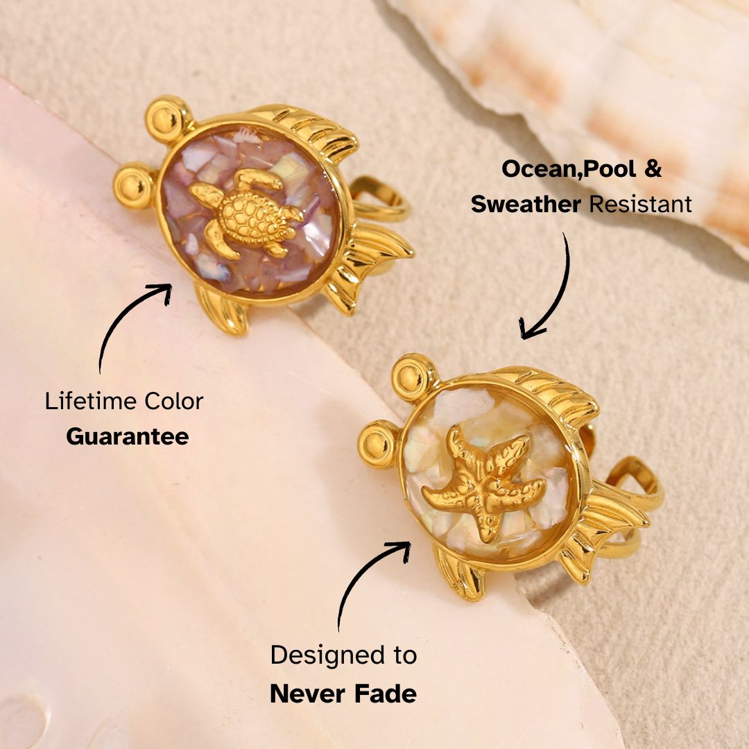 Duo	Gold rings with sea turtle and starfish designs, inlaid with shimmering shell textures