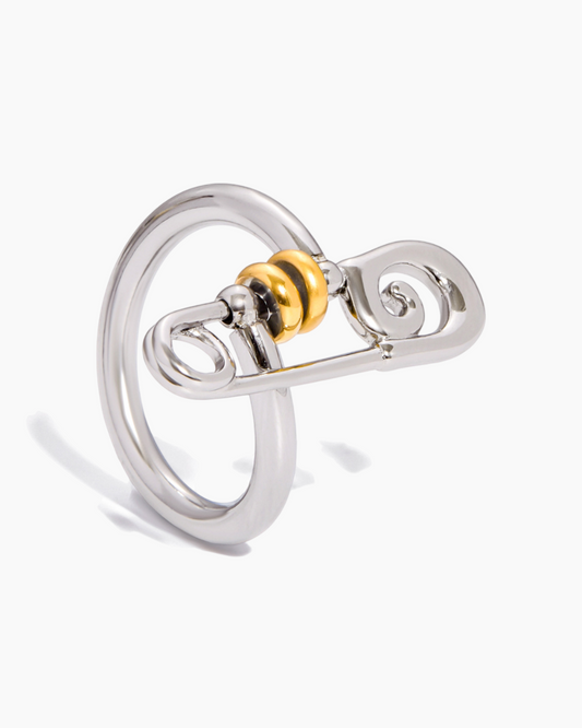 Silver ring with a yellow center on a white background