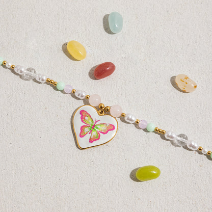 Trendy pastel beaded choker necklace with pink butterfly pendant