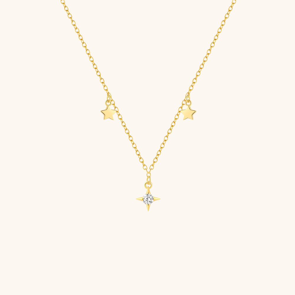 Collier à pendentif étoile et croix rayonnante