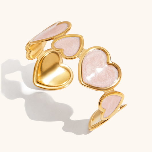 aesthetic heart bracelet placed on white background