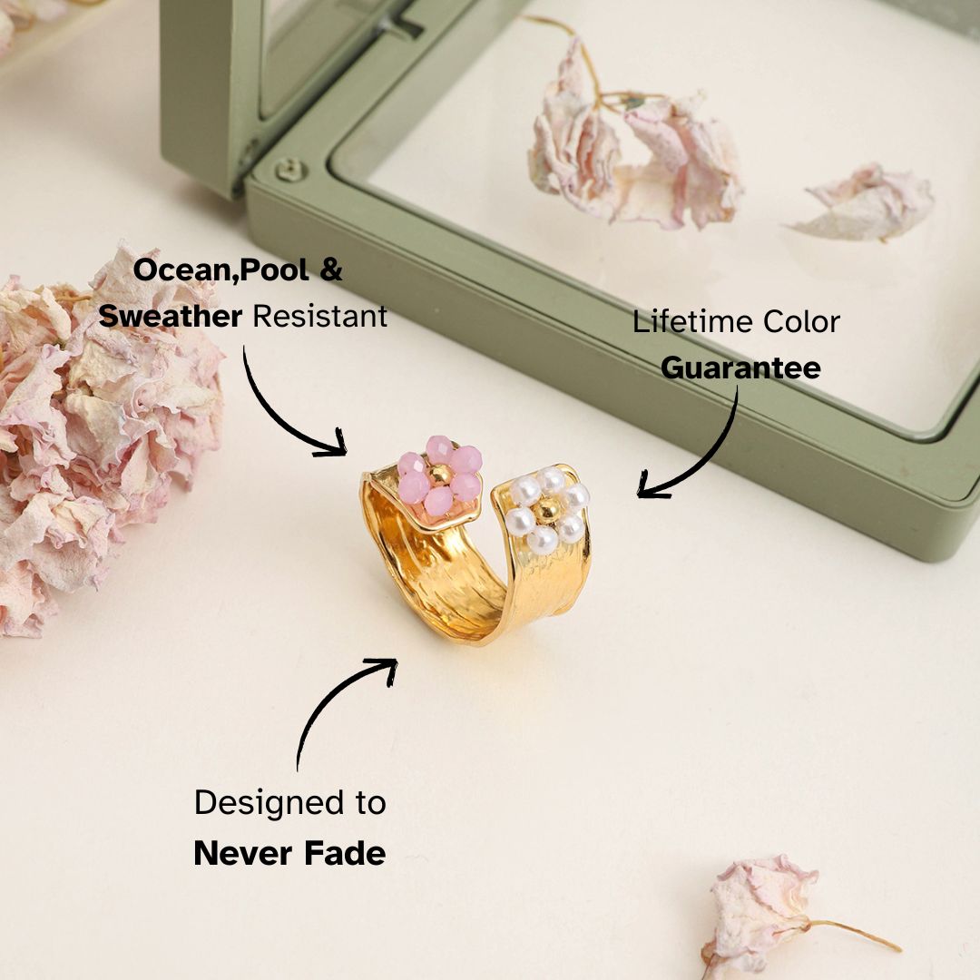 Artistic display of gold floral ring inside a mirrored jewelry box