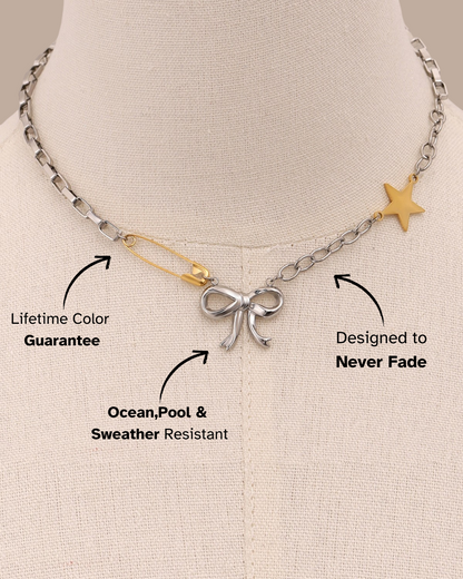 Necklace with bow and star charm on a mannequin, featuring durability and color guarantee text.