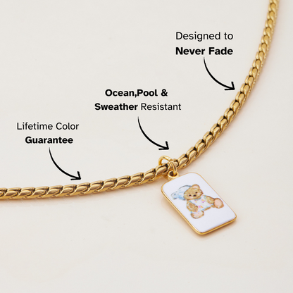 Close-up of bear charm on chunky gold necklace, waterproof and tarnish-resistant