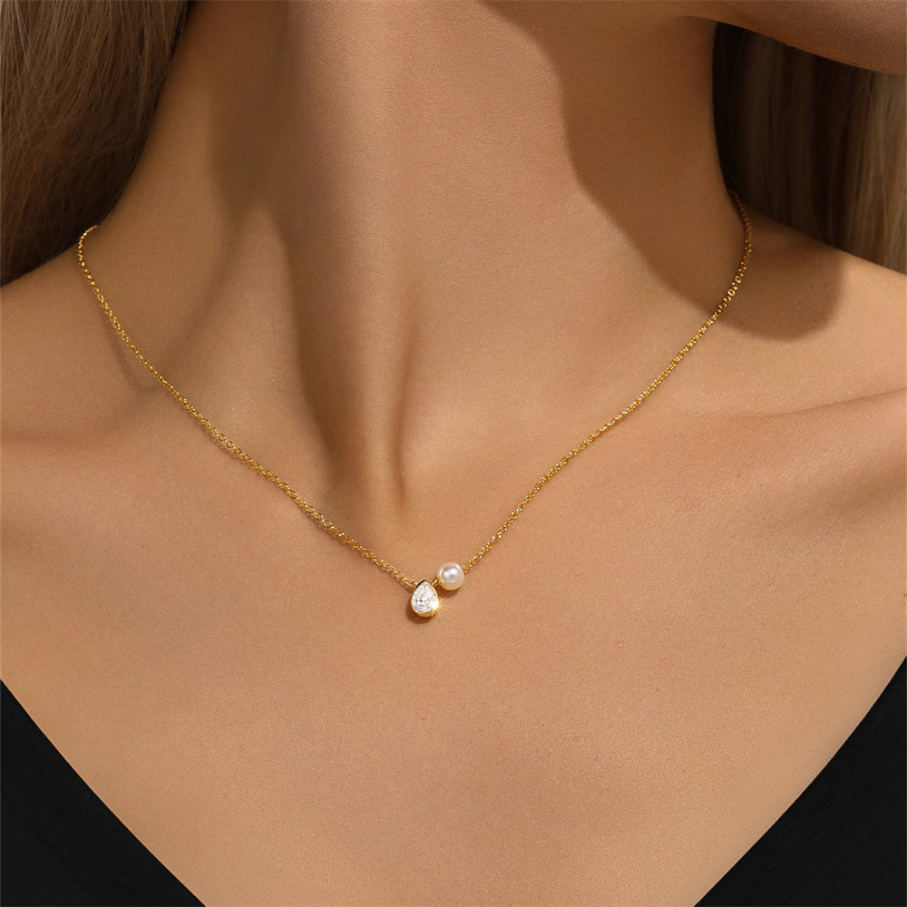 S925 sterling silver teardrop crystal and pearl necklace worn on model