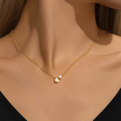 S925 sterling silver teardrop crystal and pearl necklace worn on model