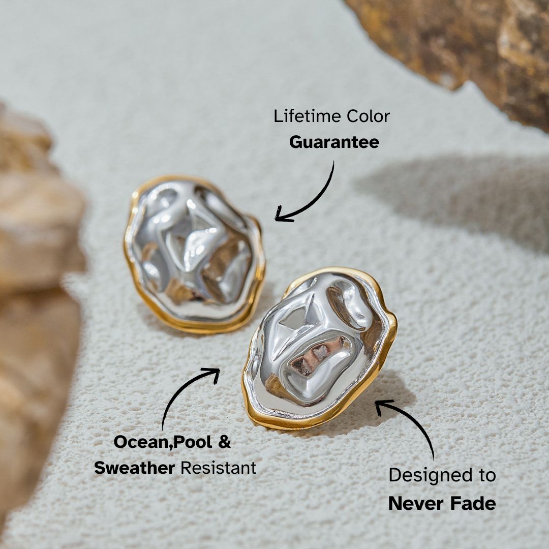 close-up of abstract gold and silver earrings on stone background, waterproof and tarnish-resistant