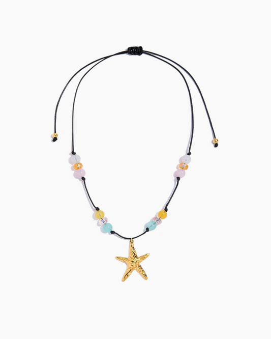 Necklace with a starfish pendant on a white background