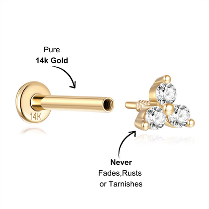 Side view of 14K gold zirconia three-stone stud earring with detailed stone arrangement.