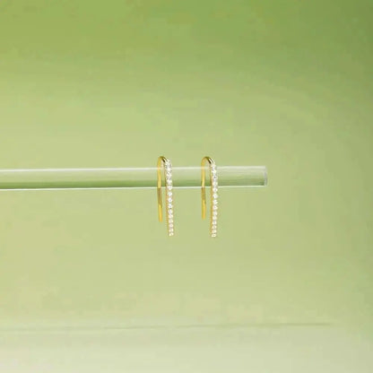 Slim Gold Threader Earrings – Sleek and simple, these gold threader earrings are a must-have for any minimalist jewelry lover. Their linear design and sparkling stones bring a refined fi