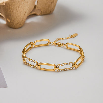 Detailed shot of crystal-studded links catching the light