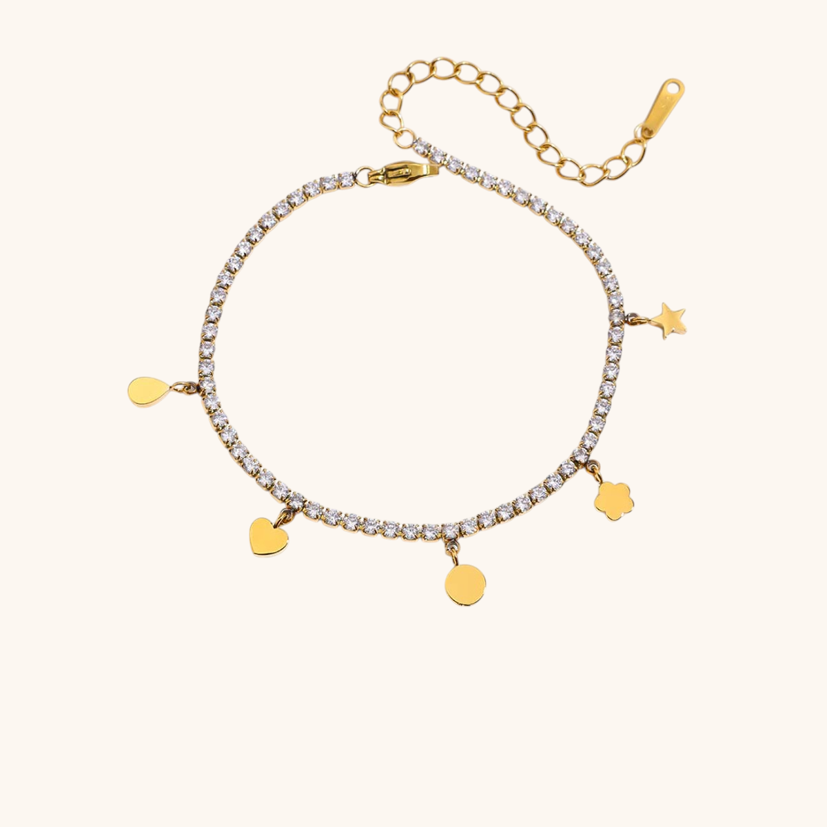 Close-up of charm tennis bracelet with star, heart, and flower pendants
