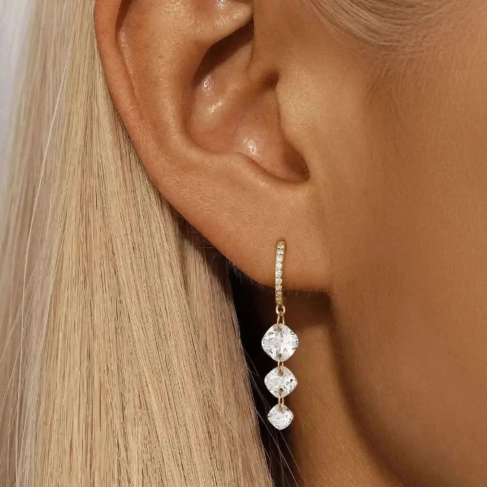 Boucles d'oreilles créoles pendantes de luxe en zircone