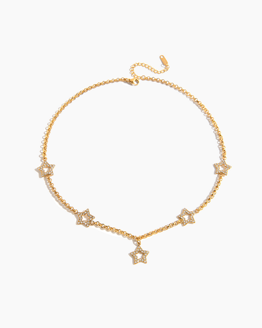 Gold bracelet with star-shaped charms on a white background