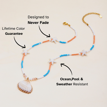 Ocean-inspired necklace with white starfish beads and gold seashell charm