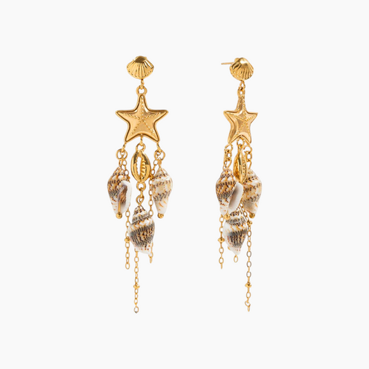 Gold earrings with star and shell designs on a white background