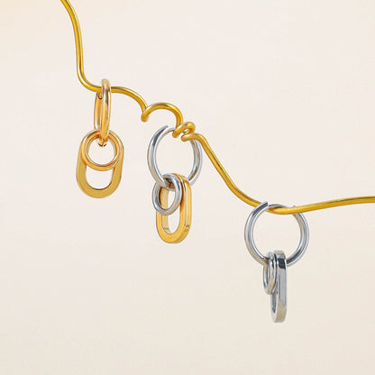 Bold statement earrings styled on ear for casual outfit