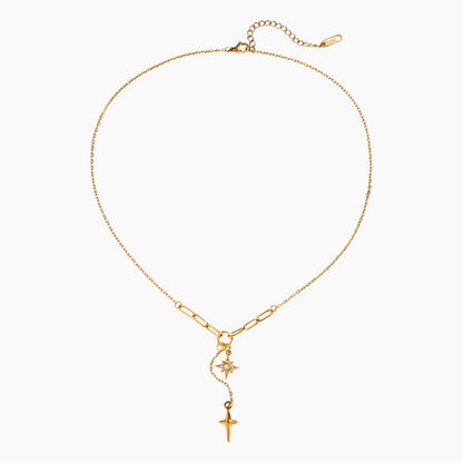 Gold necklace with star and cross pendant on a white background