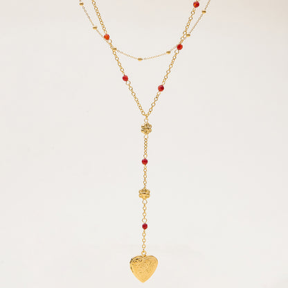 Open heart locket pendant with engraved floral pattern