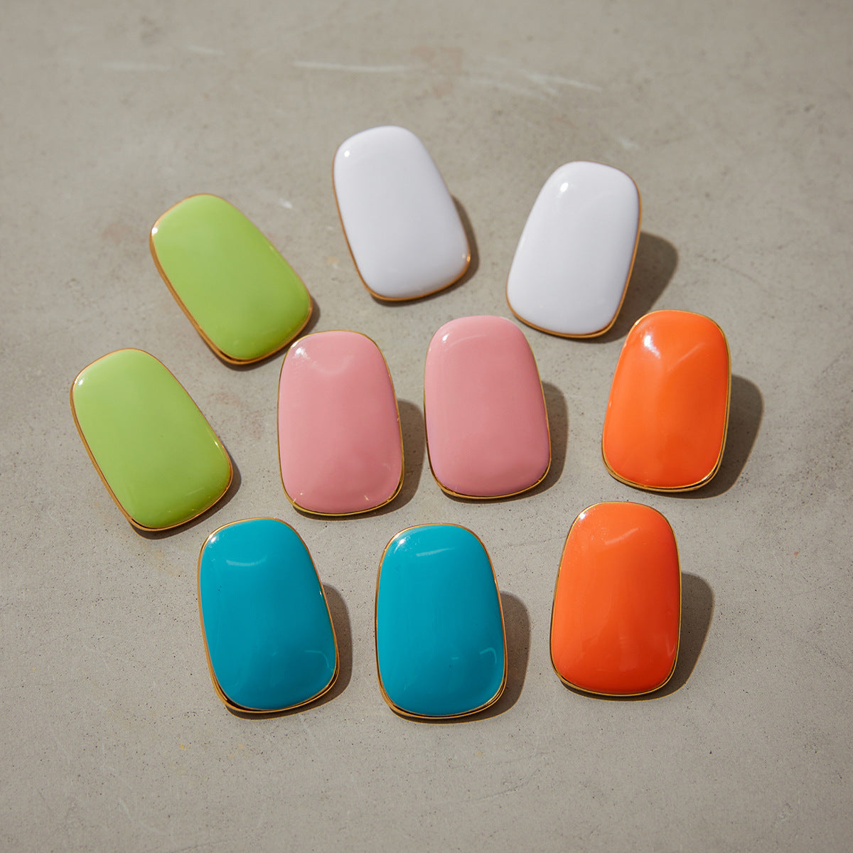 assorted enamel rectangle earrings in green, pink, white, blue, coral