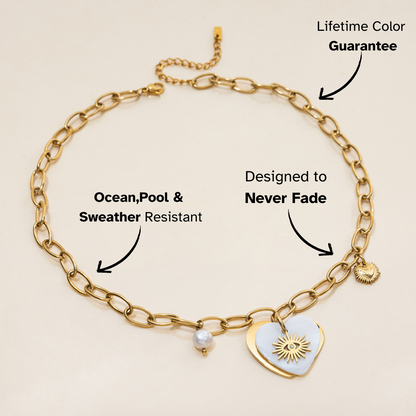 Close-up of beach-safe sun heart charm necklace