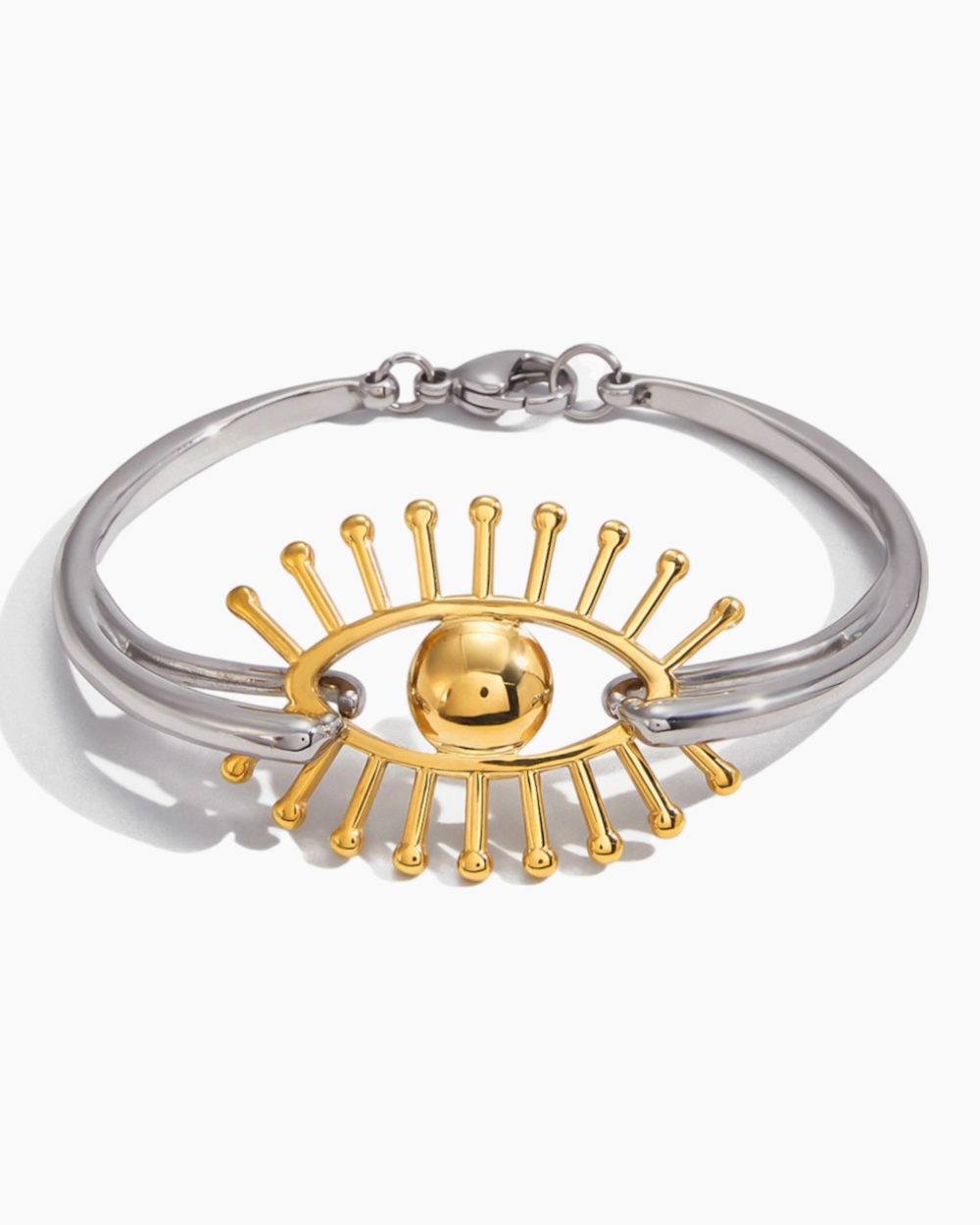 Bracelet with gold eye design on a white background