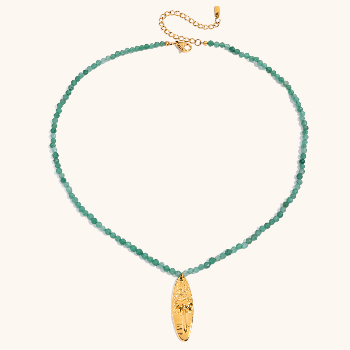 Gold palm tree necklace with green beads for summer layering