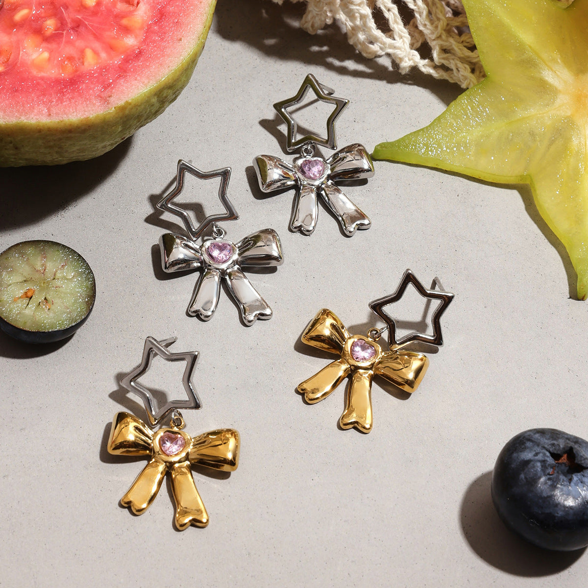 Whimsical silver and gold bow earrings inspired by Harajuku style
