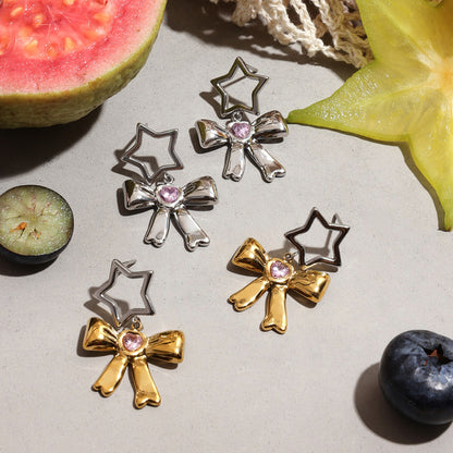 Whimsical silver and gold bow earrings inspired by Harajuku style
