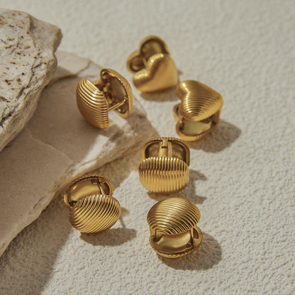 Set of sculptural clip-on earrings shown in group layout