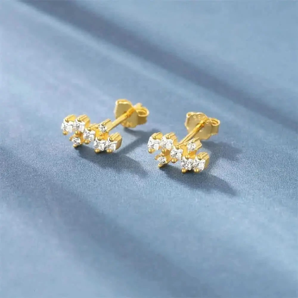 Boucles d'oreilles à tige carrées irrégulières en zircon