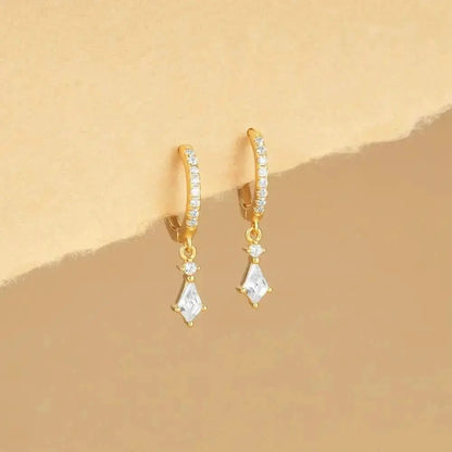 These classic gold hoops with geometric dangles add just the right amount of sparkle to any outfit.