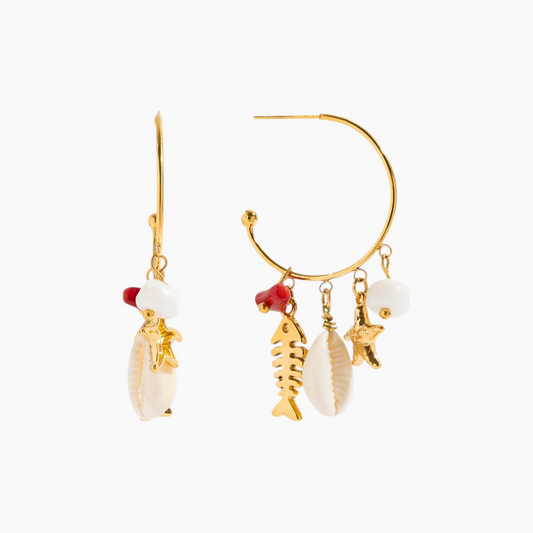 Gold hoop earrings with shell and fish charms on a white background