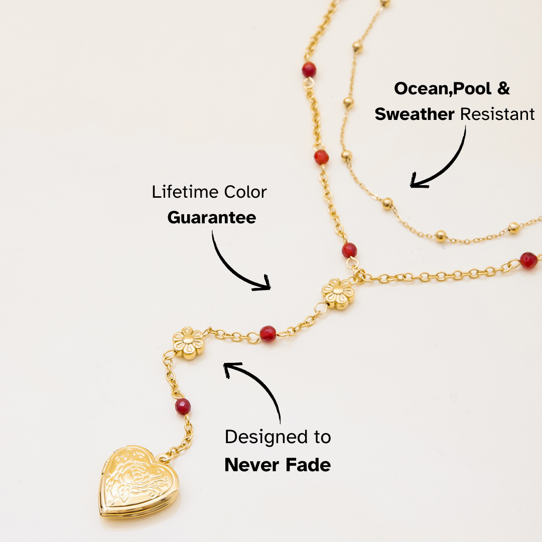Waterproof gold necklace with red beads and flower details