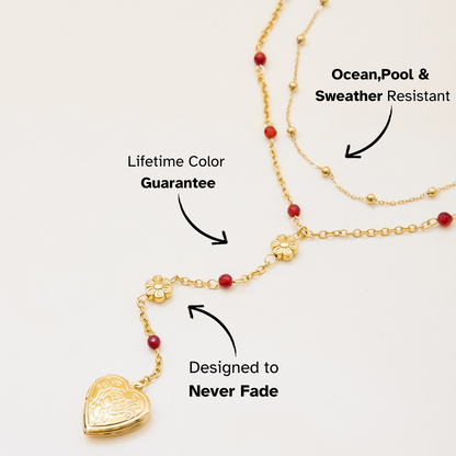 Waterproof gold necklace with red beads and flower details