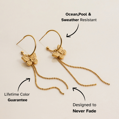 Product photo of butterfly hoop earrings with long dangling chains