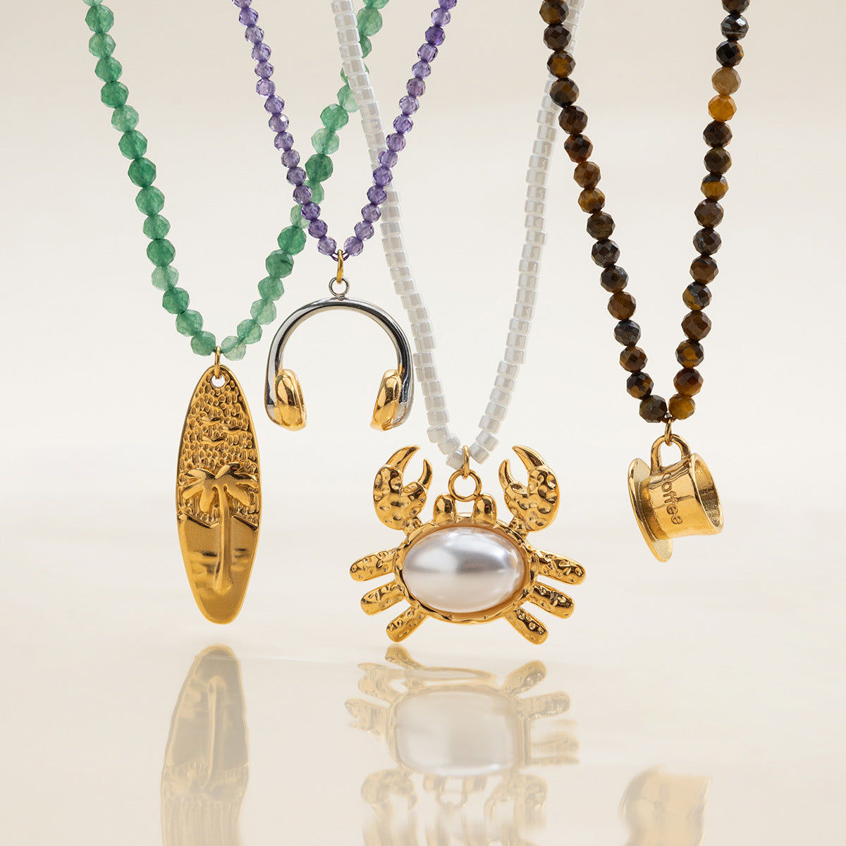 Beaded waterproof necklace with surf pendant detail