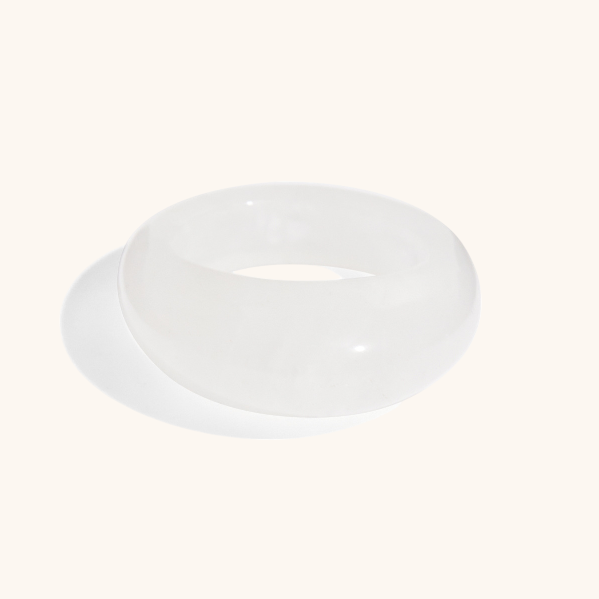 White translucent statement ring styled