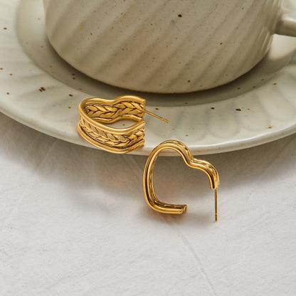 Textured gold hoop earrings styled with neutral summer outfit