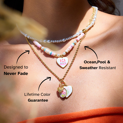 Colorful charm necklace styled with orange top for playful summer look
